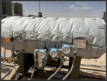 Insulated process equipment with removable blankets and access points